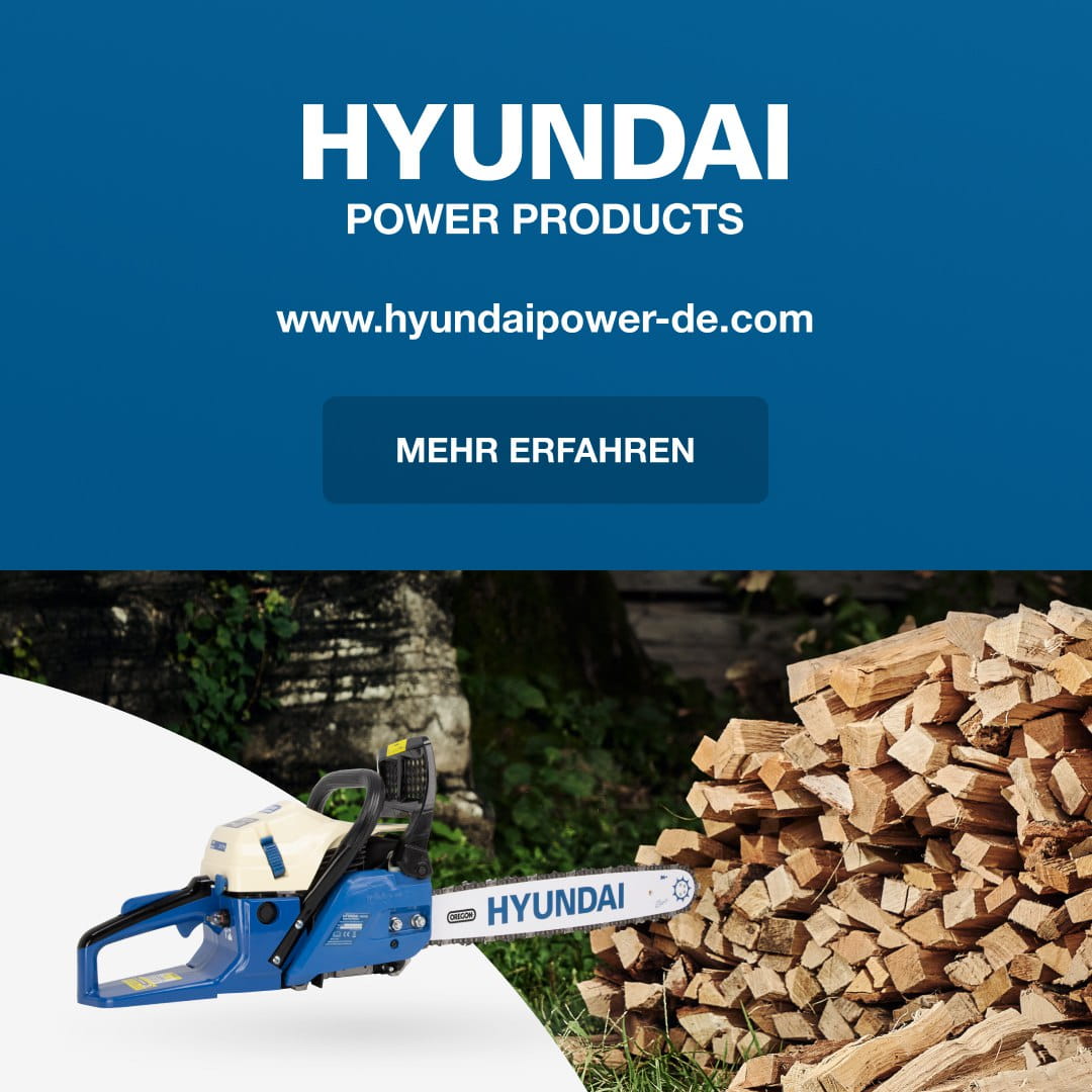 Hyundai Power Products promotional banner with the URL www.hyundaipower-de.com and a dark blue 'MEHR ERFAHREN' button; a blue Hyundai chainsaw sits beside a stack of firewood below the banner.